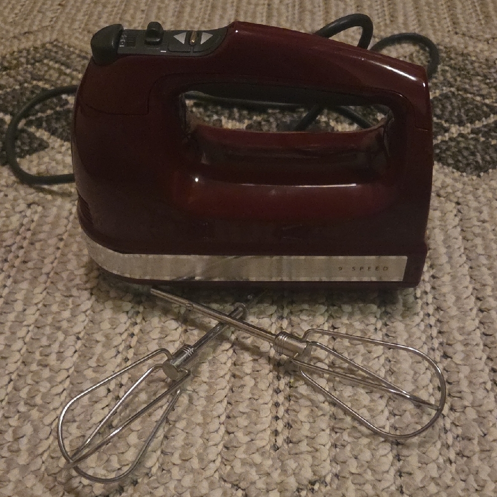 KitchenAid 9 speed deep Red Hand Mixer used once or twice. A kitchen must have.